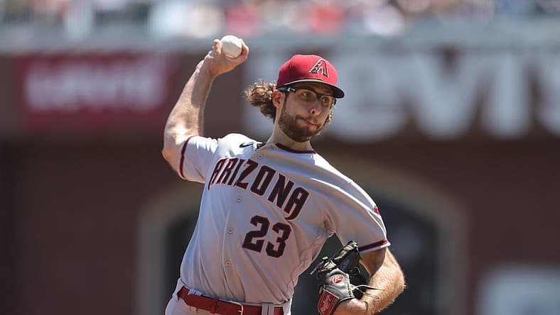 Aug 18, 2022; San Francisco, California, USA; Arizona Diamondbacks starting pitcher Zac Gallen (23) throws a pitch during the first inning against the San Francisco Giants at Oracle Park. Mandatory Credit: Sergio Estrada-USA TODAY Sports