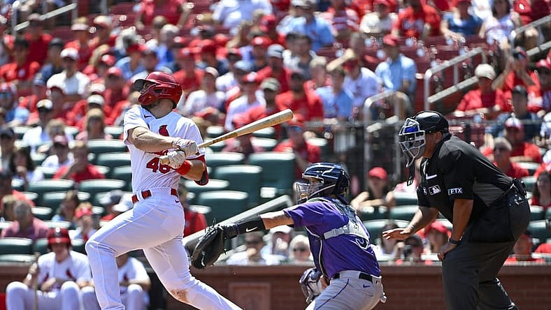 Aug 18, 2022; St. Louis, Missouri, USA;  St. Louis Cardinals first baseman Paul Goldschmidt (46) hits a one run single against the Colorado Rockies during the first inning at Busch Stadium. Mandatory Credit: Jeff Curry-USA TODAY Sports