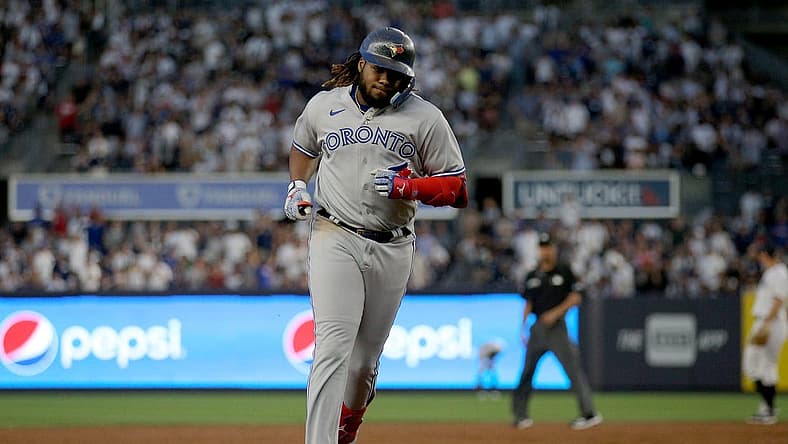 Aug 18, 2022; Bronx, New York, USA; Toronto Blue Jays first baseman Vladimir Guerrero Jr. (27) rounds the bases after hitting a three run home run against the New York Yankees during the second inning at Yankee Stadium. Mandatory Credit: Brad Penner-USA TODAY Sports