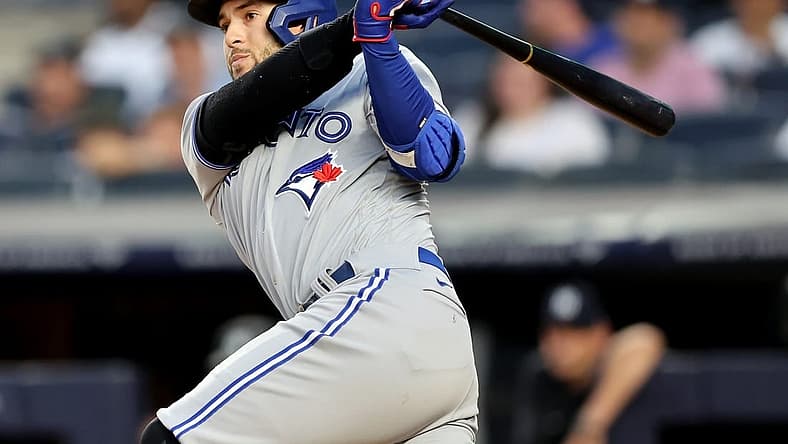 Aug 18, 2022; Bronx, New York, USA; Toronto Blue Jays designated hitter George Springer (4) follows through on an RBI single against the New York Yankees during the second inning at Yankee Stadium. Mandatory Credit: Brad Penner-USA TODAY Sports