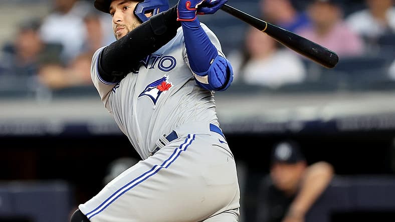 Aug 18, 2022; Bronx, New York, USA; Toronto Blue Jays designated hitter George Springer (4) follows through on an RBI single against the New York Yankees during the second inning at Yankee Stadium. Mandatory Credit: Brad Penner-USA TODAY Sports