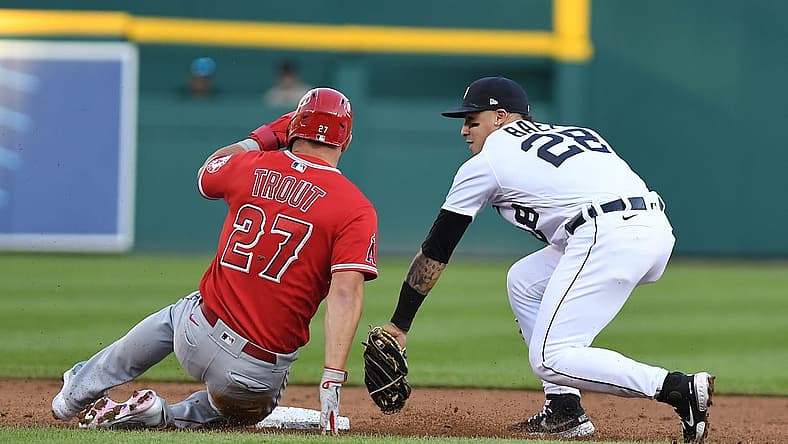 Aug 19, 2022; Detroit, Michigan, USA; Los Angeles Angels center fielder Mike Trout (27) is tagged out at second base by Detroit Tigers shortstop Javier Baez (28) to end the third inning on a fielder's choice at Comerica Park. Mandatory Credit: Lon Horwedel-USA TODAY Sports