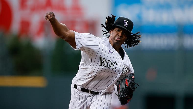 Aug 19, 2022; Denver, Colorado, USA; Colorado Rockies starting pitcher Jose Urena (51) pitches in the first inning against the San Francisco Giants at Coors Field. Mandatory Credit: Isaiah J. Downing-USA TODAY Sports