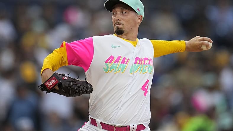 Aug 19, 2022; San Diego, California, USA;  San Diego Padres starting pitcher Blake Snell (4) pitches against the Washington Nationals during the first inning at Petco Park. Mandatory Credit: Ray Acevedo-USA TODAY Sports