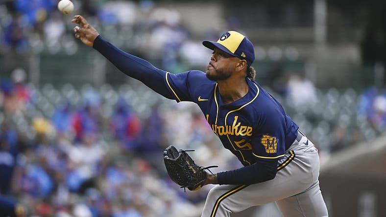 Aug 20, 2022; Chicago, Illinois, USA; Milwaukee Brewers center fielder Tyrone Taylor (15) delivers against the Chicago Cubs during the first inning at Wrigley Field. Mandatory Credit: Matt Marton-USA TODAY Sports