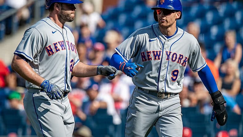 Aug 20, 2022; Philadelphia, Pennsylvania, USA; New York Mets center fielder Brandon Nimmo (9) scores on a sacrifice fly by New York Mets first baseman Darin Ruf (28) against the Philadelphia Phillies during the ninth inning at Citizens Bank Park. Mandatory Credit: John Jones-USA TODAY Sports