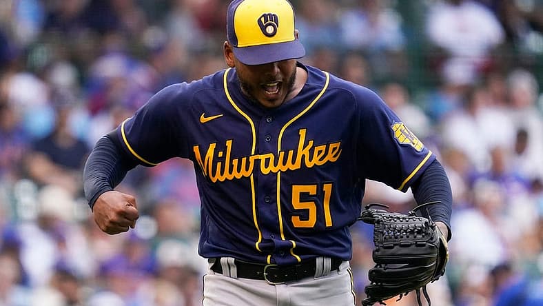 Milwaukee Brewers starting pitcher Freddy Peralta reacts as he walks to the dugout after the fifth inning of a baseball game against the Chicago Cubs in Chicago, Saturday, Aug. 20, 2022.
Freddy Peralta