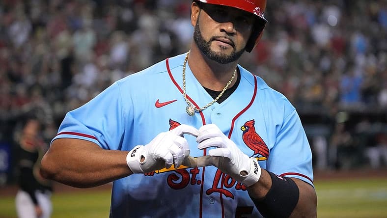 Aug 20, 2022; Phoenix, Arizona, USA; St. Louis Cardinals designated hitter Albert Pujols (5) celebrates after hitting a solo home run against the Arizona Diamondbacks during the fourth inning at Chase Field. Mandatory Credit: Joe Camporeale-USA TODAY Sports