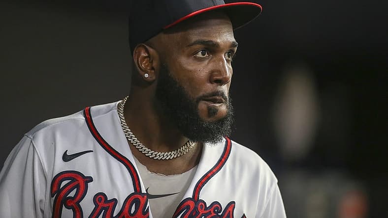 Aug 20, 2022; Atlanta, Georgia, USA; Atlanta Braves designated hitter Marcell Ozuna (20) in the dugout against the Houston Astros in the sixth inning at Truist Park. Mandatory Credit: Brett Davis-USA TODAY Sports