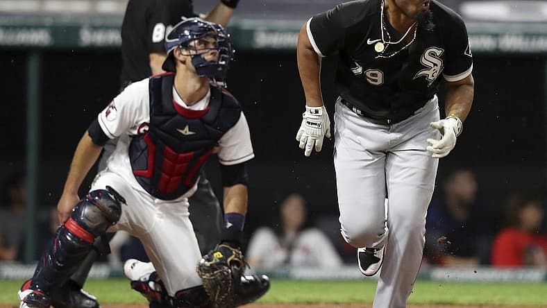 Aug 20, 2022; Cleveland, Ohio, USA; Chicago White Sox first baseman Jose Abreu (79) hits a RBI double against the Cleveland Guardians in the sixth inning at Progressive Field. Mandatory Credit: Aaron Josefczyk-USA TODAY Sports