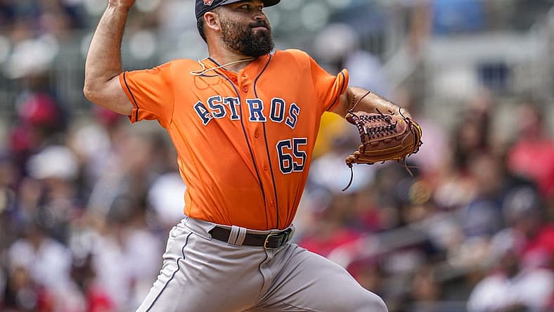 Aug 21, 2022; Cumberland, Georgia, USA; Houston Astros starting pitcher Jose Urquidy (65) pitches against the Atlanta Braves during the first inning at Truist Park. Mandatory Credit: Dale Zanine-USA TODAY Sports