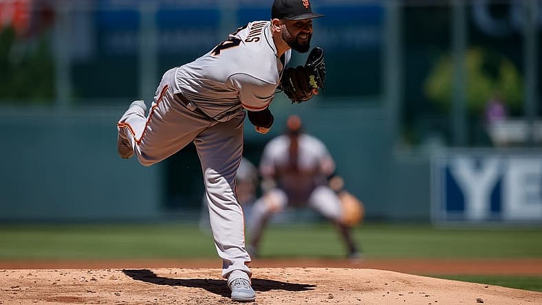 Aug 21, 2022; Denver, Colorado, USA; San Francisco Giants starting pitcher Jakob Junis (34) pitches in the first inning against the Colorado Rockies at Coors Field. Mandatory Credit: Isaiah J. Downing-USA TODAY Sports