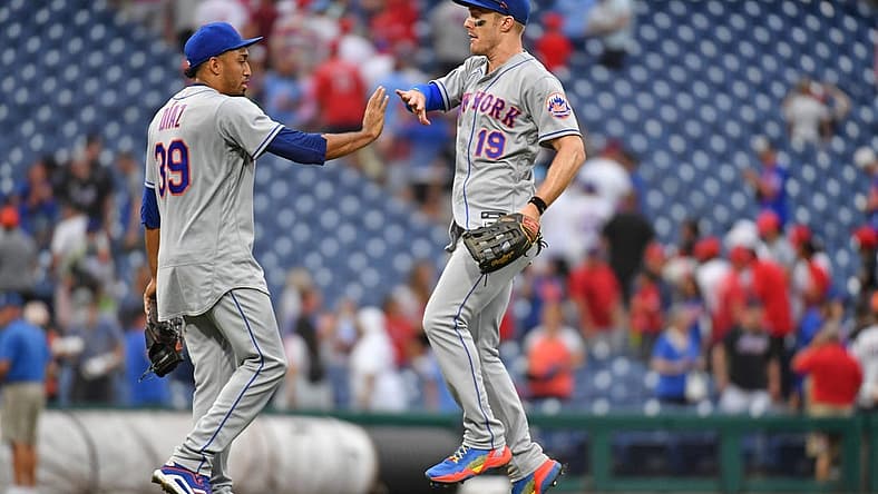 Aug 21, 2022; Philadelphia, Pennsylvania, USA; New York Mets relief pitcher Edwin Diaz (39) and left fielder Mark Canha (19) celebrate win against the Philadelphia Phillies at Citizens Bank Park. Mandatory Credit: Eric Hartline-USA TODAY Sports