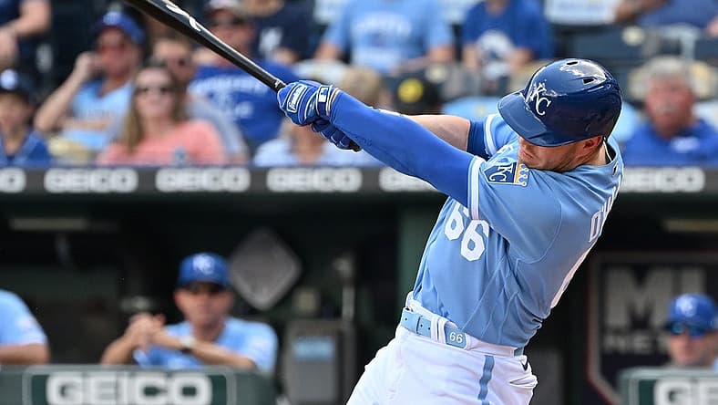 Aug 22, 2022; Kansas City, Missouri, USA; Kansas City Royals designated hitter Ryan O'Hearn (66) hits a RBI single during the first inning against the Chicago White Sox at Kauffman Stadium. Mandatory Credit: Peter Aiken-USA TODAY Sports