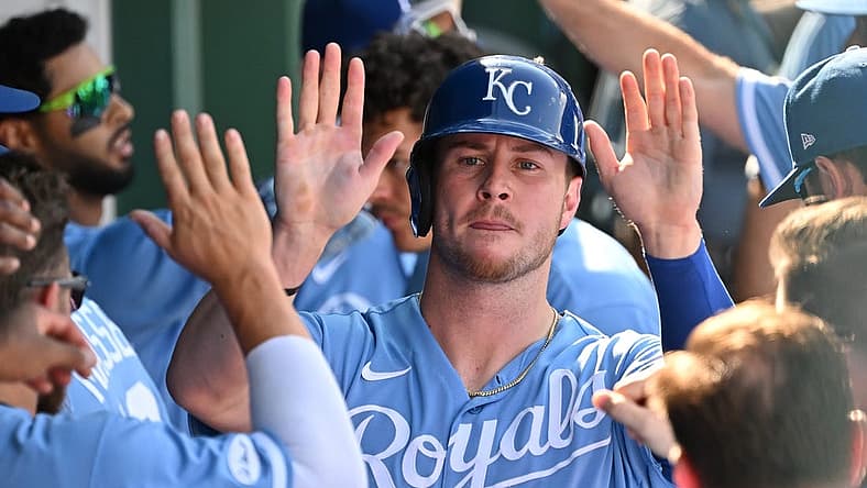 Aug 22, 2022; Kansas City, Missouri, USA; Kansas City Royals designated hitter Ryan O'Hearn (66) celebrates after scoring a run in the dugout during the eighth inning against the Chicago White Sox at Kauffman Stadium. Mandatory Credit: Peter Aiken-USA TODAY Sports