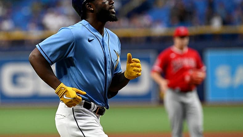 Aug 22, 2022; St. Petersburg, Florida, USA; Tampa Bay Rays right fielder Randy Arozarena (56) celebrates a solo home run in the fifth inning against the Los Angeles Angels  at Tropicana Field. Mandatory Credit: Jonathan Dyer-USA TODAY Sports