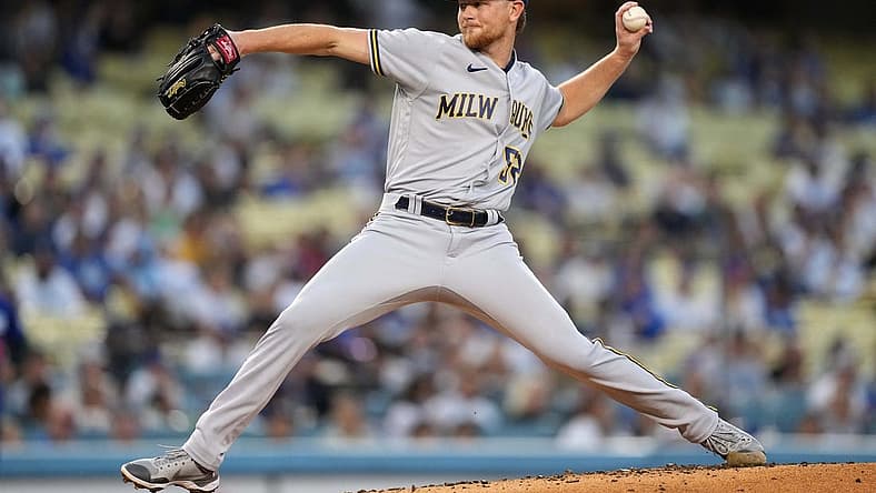 Aug 22, 2022; Los Angeles, California, USA; Milwaukee Brewers starting pitcher Eric Lauer (52) throws in the first inning against the Los Angeles Dodgers at Dodger Stadium. Mandatory Credit: Kirby Lee-USA TODAY Sports