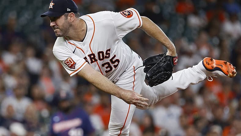 Aug 23, 2022; Houston, Texas, USA; Houston Astros starting pitcher Justin Verlander (35) delivers a pitch during the first inning against the Minnesota Twins at Minute Maid Park. Mandatory Credit: Troy Taormina-USA TODAY Sports