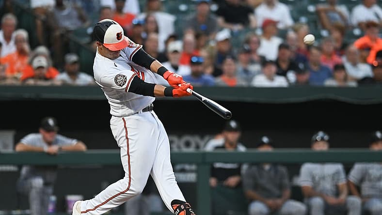 Aug 23, 2022; Baltimore, Maryland, USA; Baltimore Orioles first baseman Ryan Mountcastle (6) hits three run home run during the first inning against the Chicago White Sox at Oriole Park at Camden Yards. Mandatory Credit: Tommy Gilligan-USA TODAY Sports