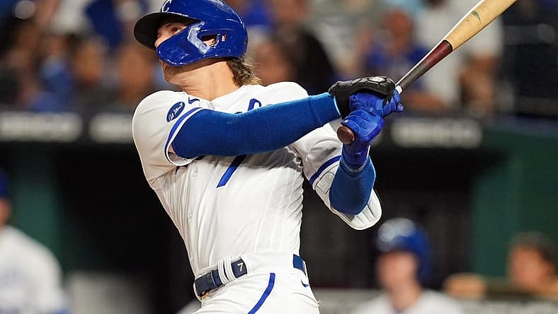 Aug 23, 2022; Kansas City, Missouri, USA; Kansas City Royals shortstop Bobby Witt Jr. (7) hits a home run against the Arizona Diamondbacks during the fourth inning at Kauffman Stadium. Mandatory Credit: Jay Biggerstaff-USA TODAY Sports
