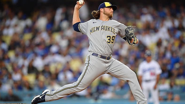Aug 23, 2022; Los Angeles, California, USA; Milwaukee Brewers starting pitcher Corbin Burnes (39) throws against the Los Angeles Dodgers during the first inning at Dodger Stadium. Mandatory Credit: Gary A. Vasquez-USA TODAY Sports
