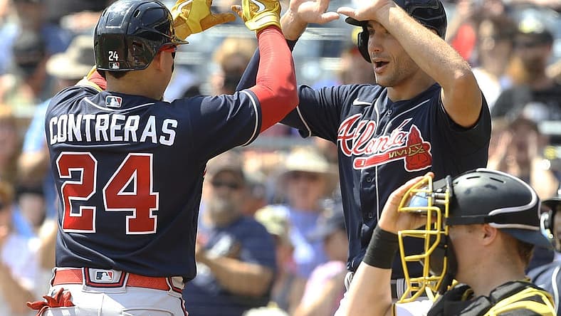 Aug 24, 2022; Pittsburgh, Pennsylvania, USA; Atlanta Braves first baseman Matt Olson (28) greets catcher William Contreras (24) crossing home plate on a two run home run against the Pittsburgh Pirates during the second inning at PNC Park. Mandatory Credit: Charles LeClaire-USA TODAY Sports