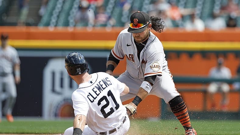 Aug 24, 2022; Detroit, Michigan, USA; Detroit Tigers first baseman Kody Clemens (21) slides in safe at second ahead of the tag by San Francisco Giants shortstop Brandon Crawford (35) in the fourth inning at Comerica Park. Mandatory Credit: Rick Osentoski-USA TODAY Sports
