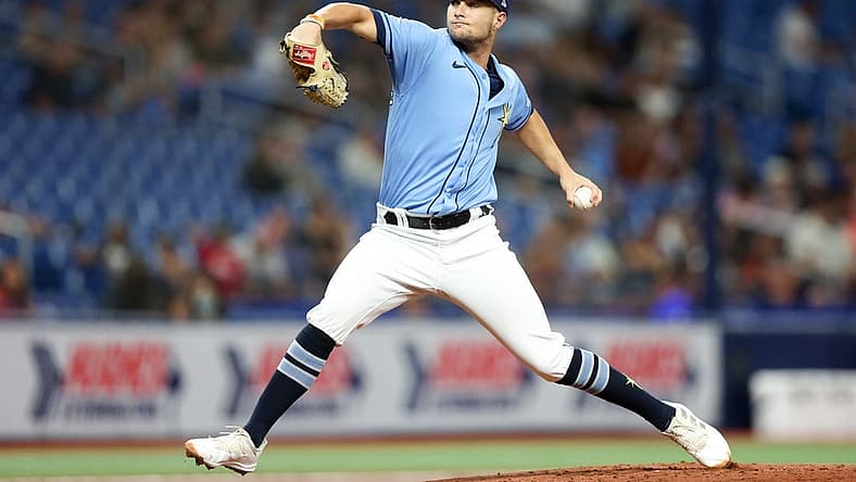 Aug 24, 2022; St. Petersburg, Florida, USA;  Tampa Bay Rays starting pitcher Shane McClanahan (18) throws a pitch against the Los Angeles Angels in the first inning at Tropicana Field. Mandatory Credit: Nathan Ray Seebeck-USA TODAY Sports