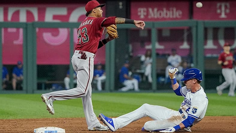 Aug 24, 2022; Kansas City, Missouri, USA; Arizona Diamondbacks shortstop Sergio Alcantara (43) gets the force out on Kansas City Royals right fielder Drew Waters (6) and throws to first base in the third inning at Kauffman Stadium. Mandatory Credit: Denny Medley-USA TODAY Sports