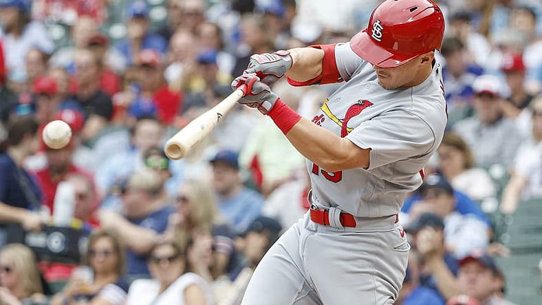 Aug 25, 2022; Chicago, Illinois, USA; St. Louis Cardinals second baseman Tommy Edman (19) singles against the Chicago Cubs during the first inning at Wrigley Field. Mandatory Credit: Kamil Krzaczynski-USA TODAY Sports