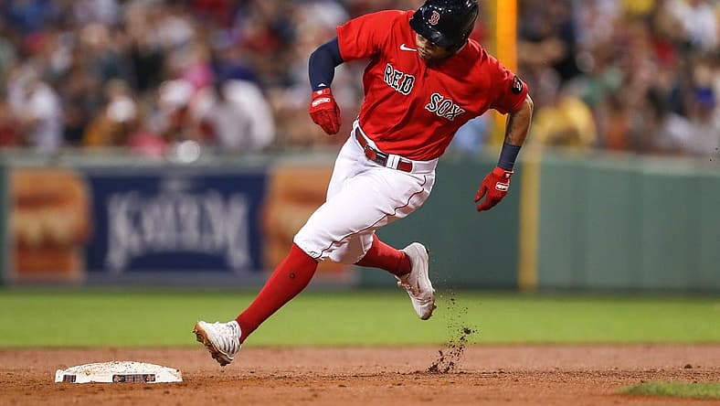 Aug 25, 2022; Boston, Massachusetts, USA; Boston Red Sox left fielder Tommy Pham (22) rounds second base during the third inning against the Toronto Blue Jays at Fenway Park. Mandatory Credit: Paul Rutherford-USA TODAY Sports