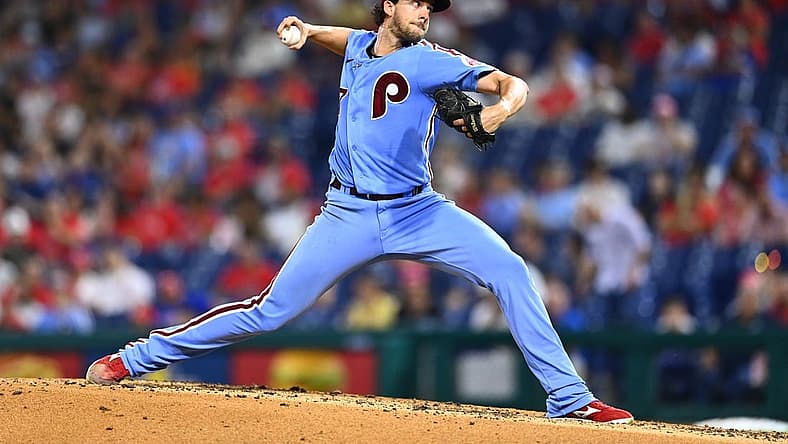 Aug 25, 2022; Philadelphia, Pennsylvania, USA; Philadelphia Phillies pitcher Aaron Nola (27) throws a pitch against the Cincinnati Reds in the fifth inning at Citizens Bank Park. Mandatory Credit: Kyle Ross-USA TODAY Sports