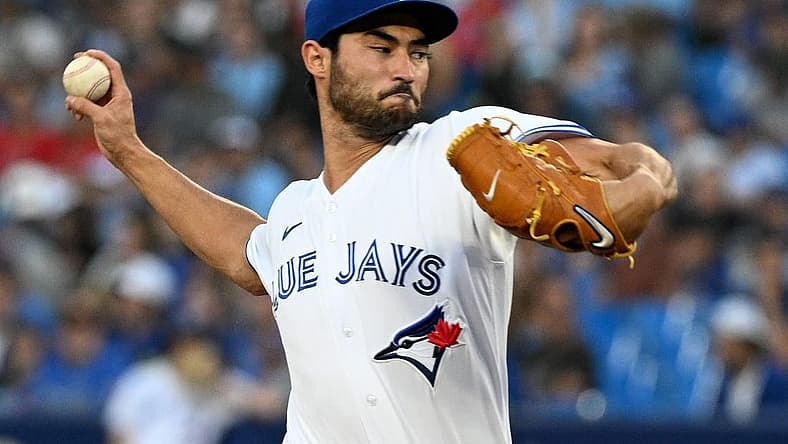 Aug 26, 2022; Toronto, Ontario, CAN; Toronto Blue Jays starting pitcher Mitch White (45) delivers a pitch against the Los Angeles Angeles in the first inning at Rogers Centre. Mandatory Credit: Dan Hamilton-USA TODAY Sports