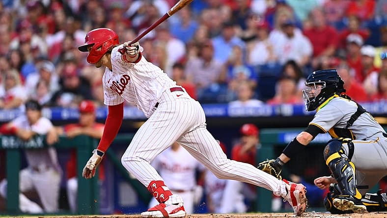 Aug 26, 2022; Philadelphia, Pennsylvania, USA; Philadelphia Phillies third baseman Alec Bohm (28) hits an infield single against the Pittsburgh Pirates in the first inning at Citizens Bank Park. Mandatory Credit: Kyle Ross-USA TODAY Sports