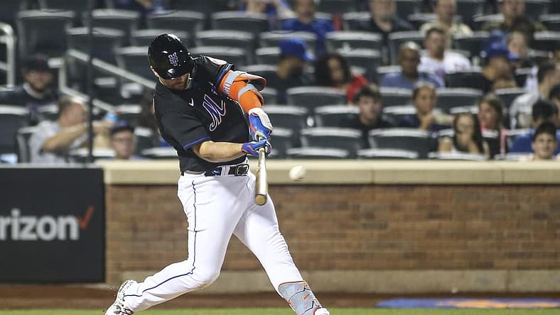 Aug 26, 2022; New York City, New York, USA; New York Mets first baseman Pete Alonso (20) hits a single in the fourth inning against the Colorado Rockies at Citi Field. Mandatory Credit: Wendell Cruz-USA TODAY Sports