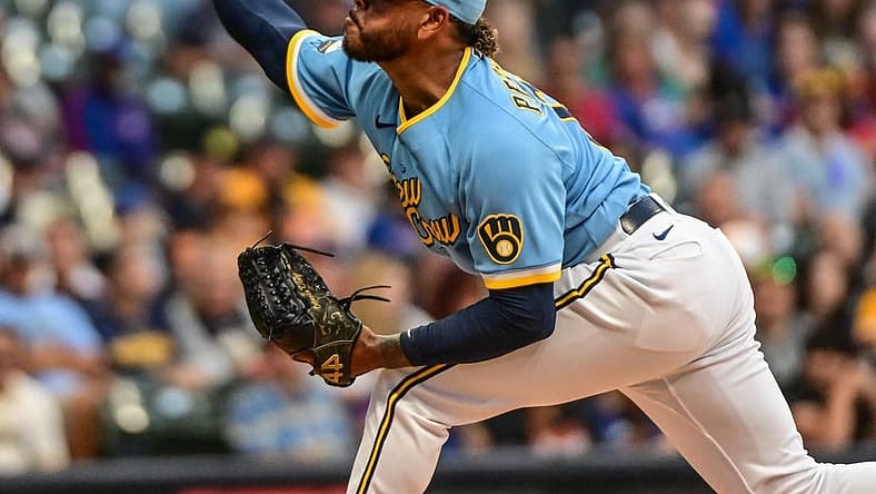 Aug 26, 2022; Milwaukee, Wisconsin, USA; Milwaukee Brewers pitcher Freddy Peralta (51) throws a pitch in the first inning against the Chicago Cubs at American Family Field. Mandatory Credit: Benny Sieu-USA TODAY Sports