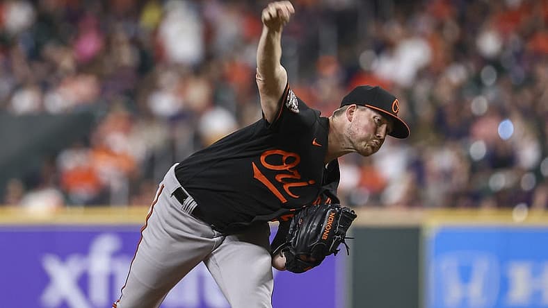 Aug 26, 2022; Houston, Texas, USA; Baltimore Orioles starting pitcher Kyle Bradish (56) delivers a pitch during the second inning against the Houston Astros at Minute Maid Park. Mandatory Credit: Troy Taormina-USA TODAY Sports
