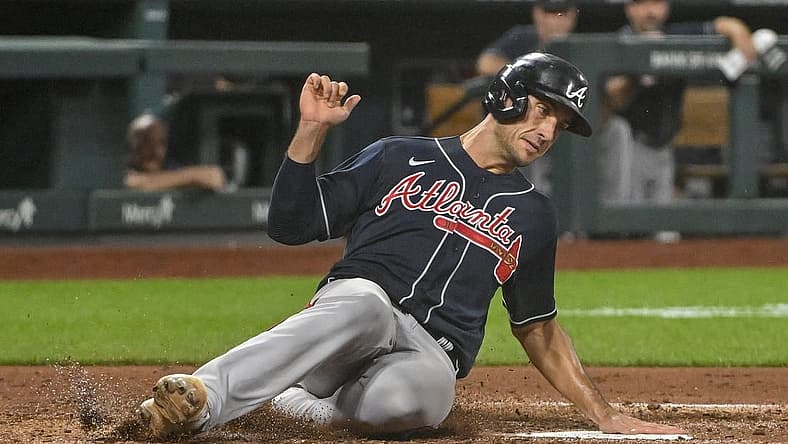 Aug 26, 2022; St. Louis, Missouri, USA; Atlanta Braves first baseman Matt Olson (28) slides safely in at home against the St. Louis Cardinals during the fourth inning at Busch Stadium. Mandatory Credit: Jeff Curry-USA TODAY Sports