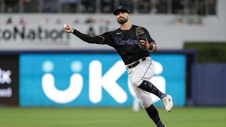 Aug 26, 2022; Miami, Florida, USA; Miami Marlins second baseman Jon Berti (5) throws to first base to retire Los Angeles Dodgers first baseman Freddie Freeman (not pictured) during the fifth inning at loanDepot Park. Mandatory Credit: Sam Navarro-USA TODAY Sports