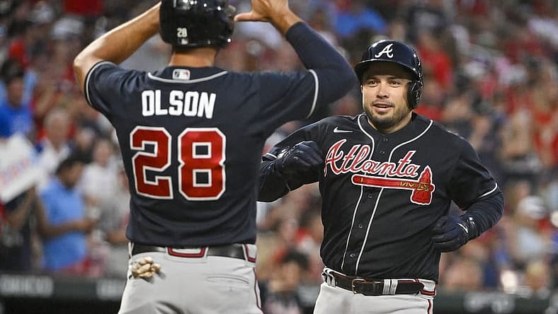 Aug 27, 2022; St. Louis, Missouri, USA;  Atlanta Braves catcher Travis d'Arnaud (16) celebrates with first baseman Matt Olson (28) after hitting a three run home run against the St. Louis Cardinals during the fourth inning at Busch Stadium. Mandatory Credit: Jeff Curry-USA TODAY Sports