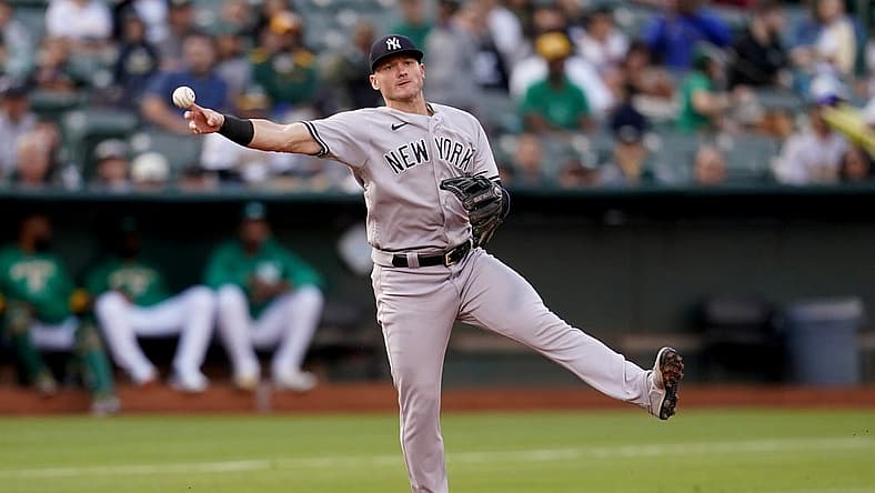 Aug 27, 2022; Oakland, California, USA; New York Yankees third baseman Josh Donaldson (28) throws to first to record an out against the Oakland Athletics in the fourth inning at RingCentral Coliseum. Mandatory Credit: Cary Edmondson-USA TODAY Sports