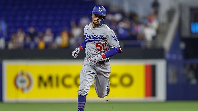 Aug 28, 2022; Miami, Florida, USA; Los Angeles Dodgers right fielder Mookie Betts (50) circles the bases after hitting a home run during the first inning against the Miami Marlins at loanDepot Park. Mandatory Credit: Sam Navarro-USA TODAY Sports