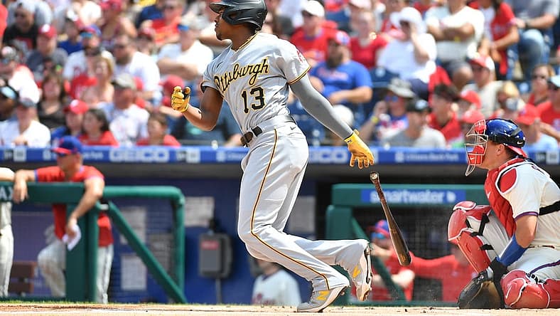 Aug 28, 2022; Philadelphia, Pennsylvania, USA; Pittsburgh Pirates third baseman Ke'Bryan Hayes (13) hits an RBI single during the first inning against the Philadelphia Phillies at Citizens Bank Park. Mandatory Credit: Eric Hartline-USA TODAY Sports