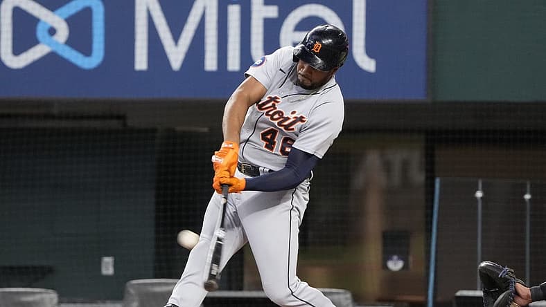 Aug 28, 2022; Arlington, Texas, USA; Detroit Tigers third baseman Jeimer Candelario (46) connects for a two-run home run against the Texas Rangers during the second inning at Globe Life Field. Mandatory Credit: Jim Cowsert-USA TODAY Sports