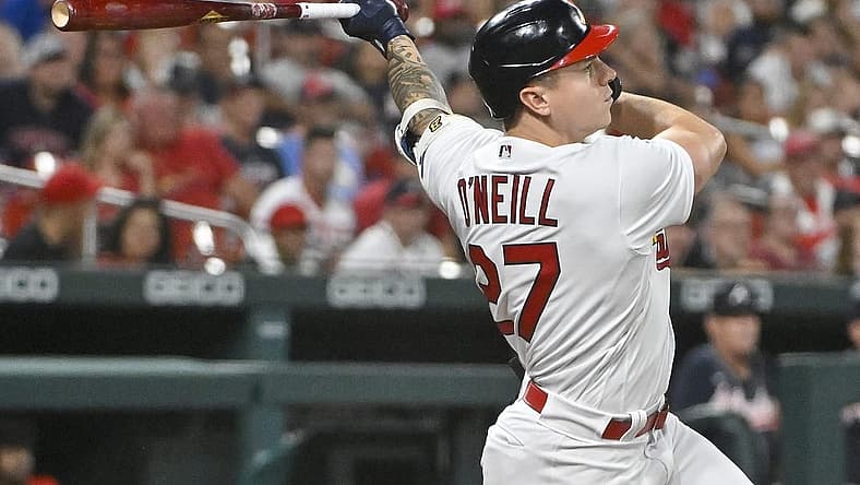 Aug 28, 2022; St. Louis, Missouri, USA; St. Louis Cardinals left fielder Tyler O'Neill (27) hits a go ahead three run home run against the Atlanta Braves during the eighth inning at Busch Stadium. Mandatory Credit: Jeff Curry-USA TODAY Sports