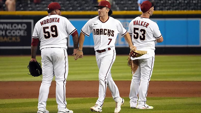 Aug 29, 2022; Phoenix, Arizona, USA; Arizona Diamondbacks right fielder Corbin Carroll (7) celebrates with teammates after defeating the Philadelphia Phillies at Chase Field. Mandatory Credit: Joe Camporeale-USA TODAY Sports