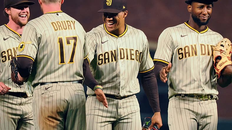 Aug 29, 2022; San Francisco, California, USA; San Diego Padres first baseman Brandon Drury (17) celebrates with right fielder Juan Soto (22) after a win against the San Francisco Giants at Oracle Park. Mandatory Credit: Kelley L Cox-USA TODAY Sports