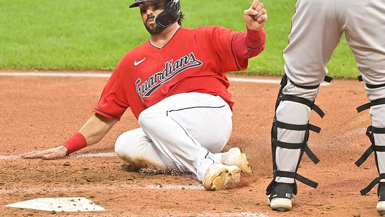 Aug 30, 2022; Cleveland, Ohio, USA; Cleveland Guardians catcher Austin Hedges (17) scores a run in the fifth inning against the Baltimore Orioles at Progressive Field. Mandatory Credit: David Richard-USA TODAY Sports