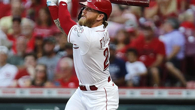 Aug 30, 2022; Cincinnati, Ohio, USA; Cincinnati Reds designated hitter Jake Fraley (27) hits an RBI double against the St. Louis Cardinals during the third inning at Great American Ball Park. Mandatory Credit: David Kohl-USA TODAY Sports