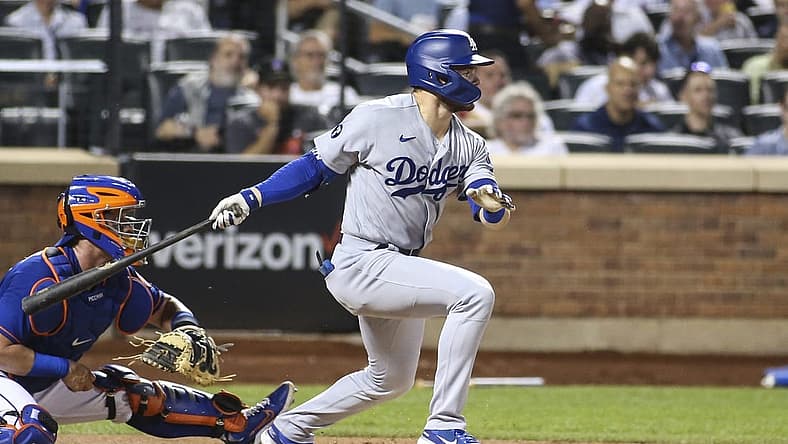 Aug 30, 2022; New York City, New York, USA; Los Angeles Dodgers second baseman Gavin Lux (9) hits a two-RBI double in the third inning against the New York Mets at Citi Field. Mandatory Credit: Wendell Cruz-USA TODAY Sports